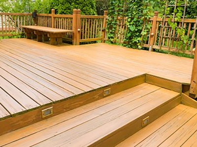 Wooden deck of family home at summer.